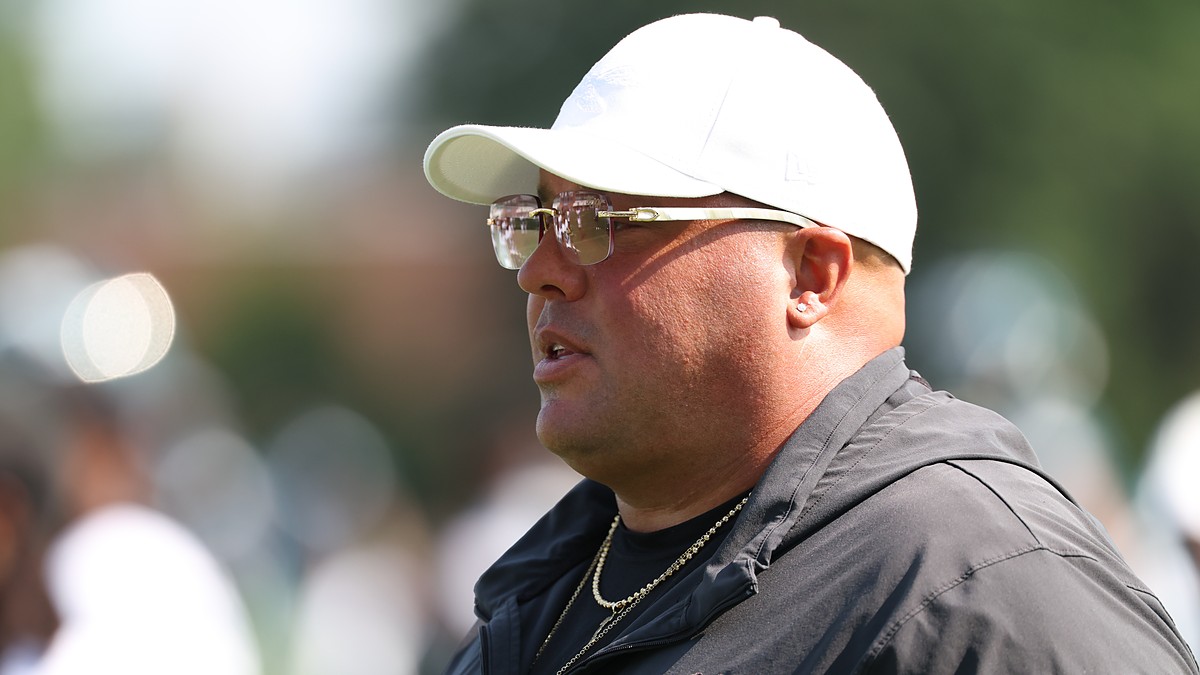 Philadelphia Eagles chief security officer Dom DiSandro watches practice during training camp.