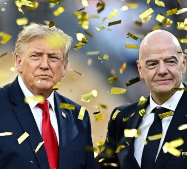 Donald Trump and FIFA President Gianni Infantino stand together amid falling confetti after the World Cup final.