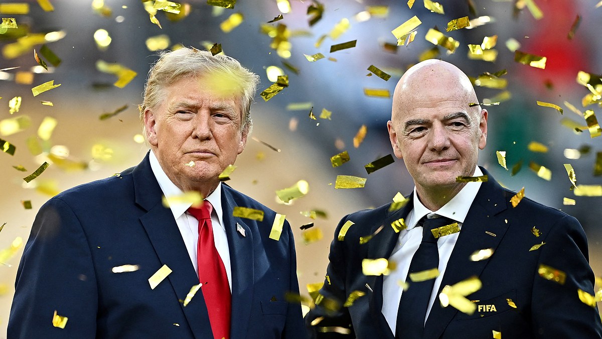 Donald Trump and FIFA President Gianni Infantino stand together amid falling confetti after the World Cup final.