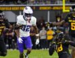 TCU wide receiver Dozie Ezukanma looks back as Arizona State defenders converge after an interception.