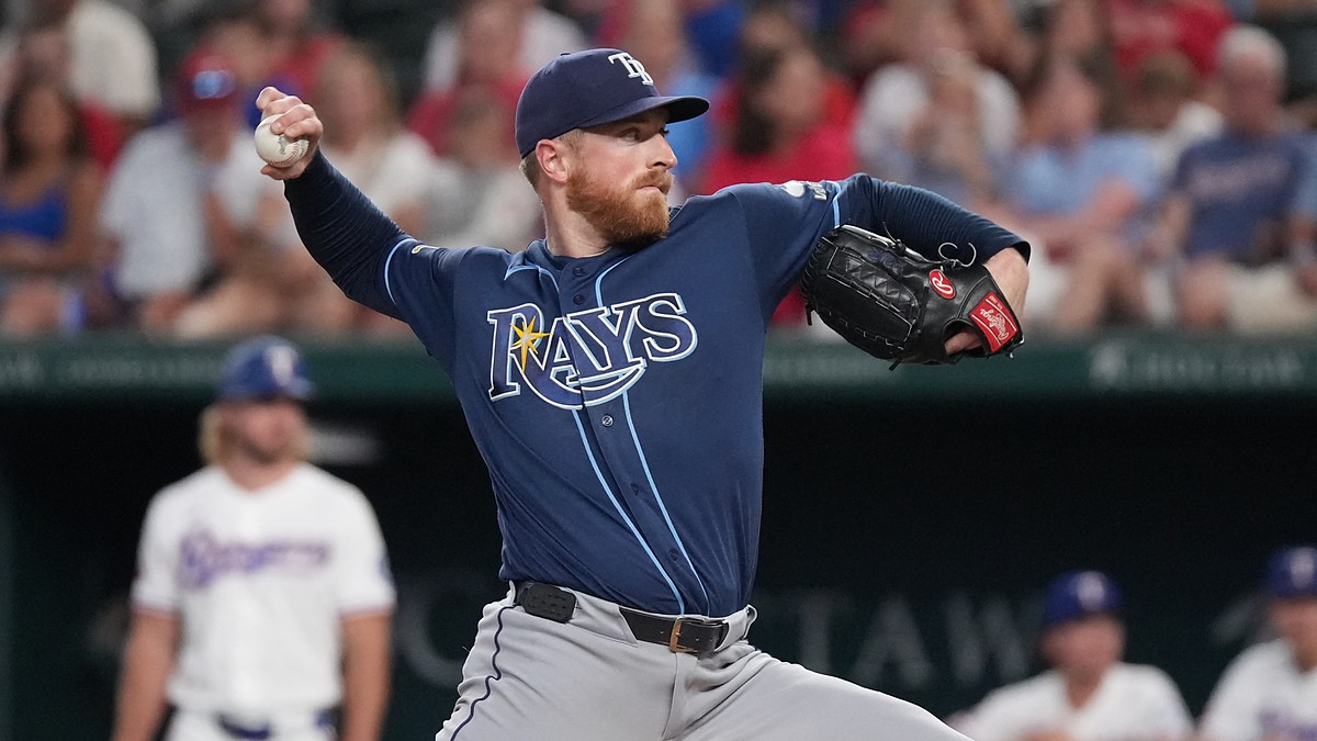Tampa Bay Rays starting pitcher Drew Rasmussen, No. 57, comes set to deliver a pitch.