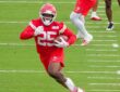 Kansas City Chiefs running back Emari Demercado carries the ball through a drill at training camp.
