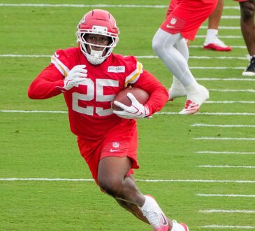 Kansas City Chiefs running back Emari Demercado carries the ball through a drill at training camp.
