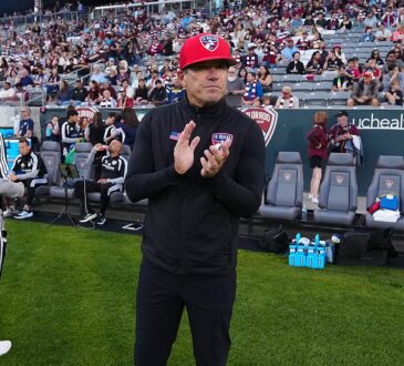 FC Dallas head coach Eric Quill applauds from the touchline before the match against the Colorado Rapids.