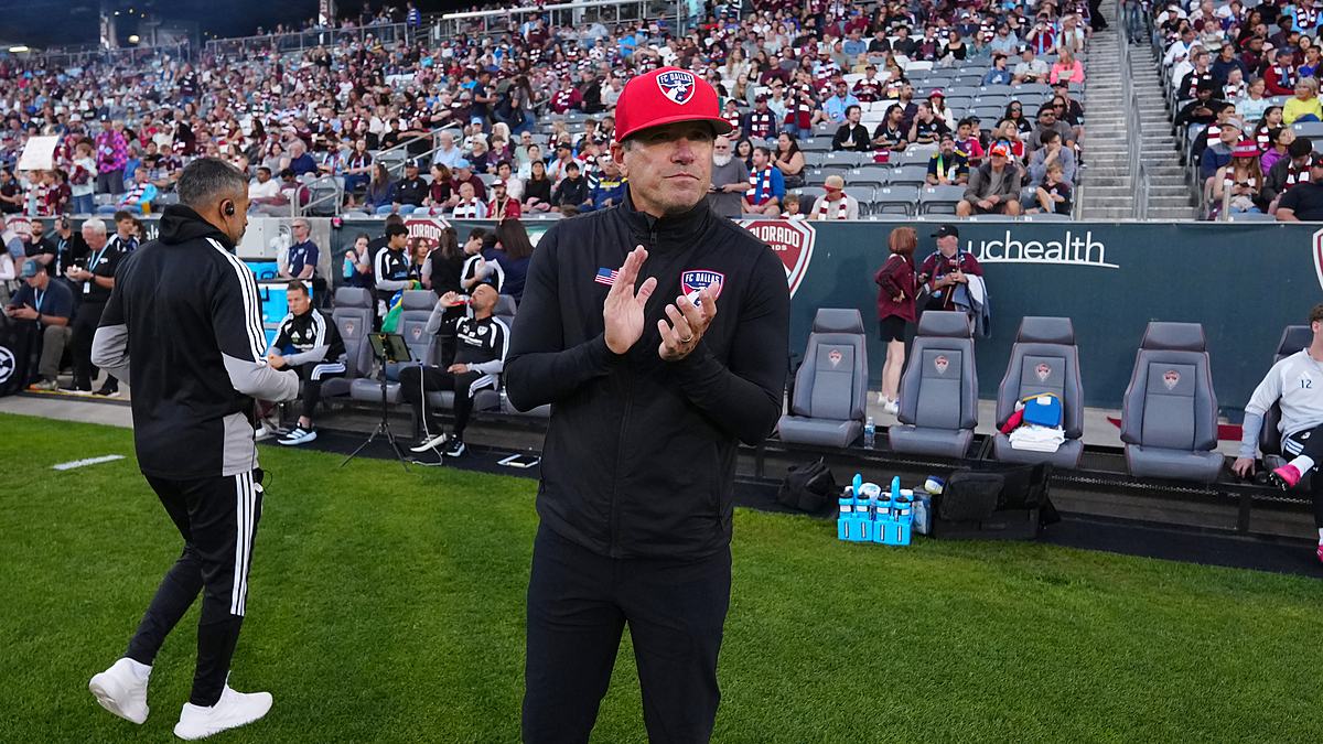 FC Dallas head coach Eric Quill applauds from the touchline before the match against the Colorado Rapids.