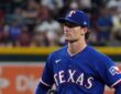 Texas Rangers pitcher Jacob Latz stands on the mound between pitches against Arizona at Chase Field.