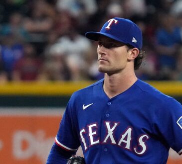Texas Rangers pitcher Jacob Latz stands on the mound between pitches against Arizona at Chase Field.