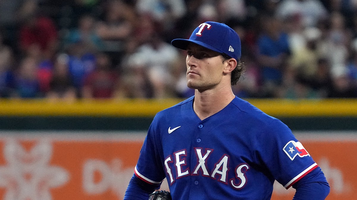 Texas Rangers pitcher Jacob Latz stands on the mound between pitches against Arizona at Chase Field.