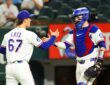 Rangers pitcher Jacob Latz shakes hands with his catcher on the mound after the final out.