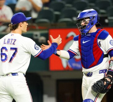 Rangers pitcher Jacob Latz shakes hands with his catcher on the mound after the final out.