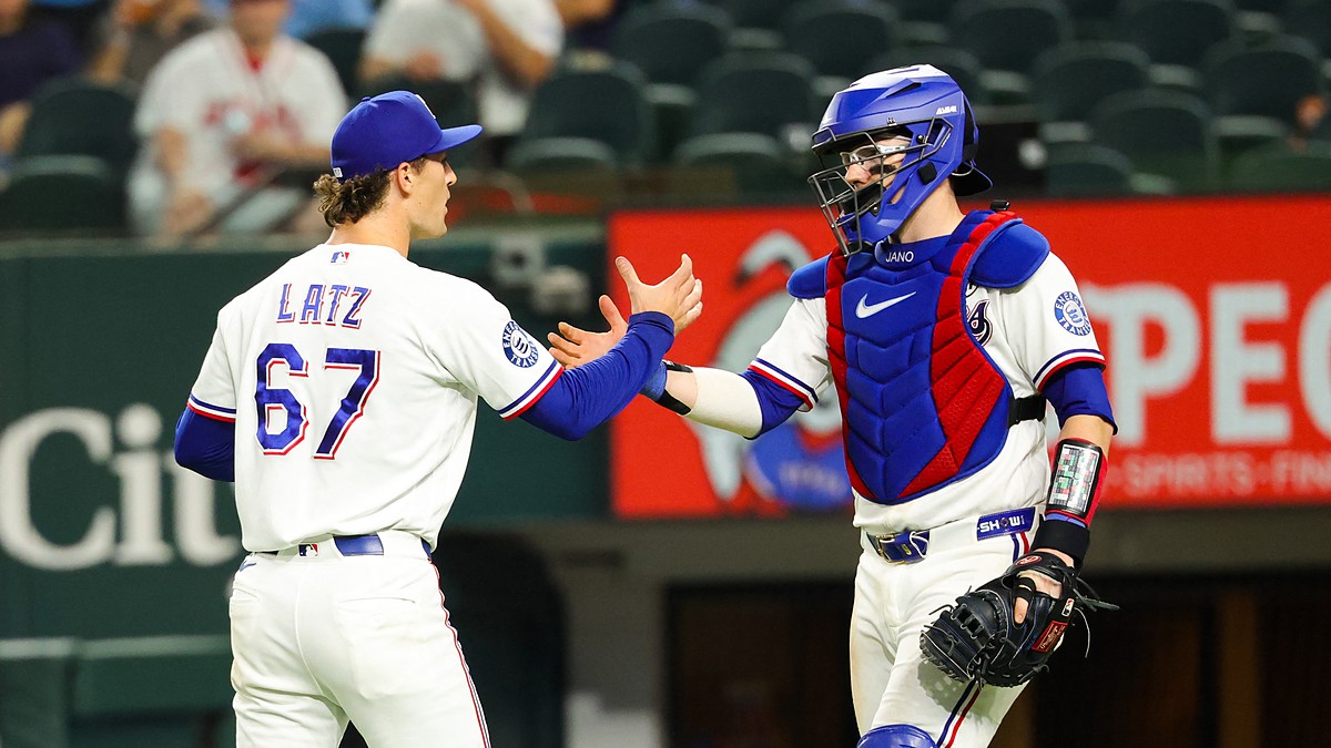 Rangers pitcher Jacob Latz shakes hands with his catcher on the mound after the final out.