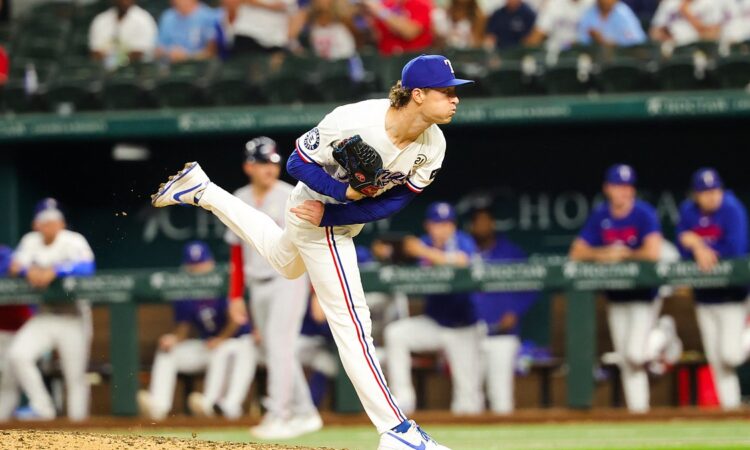 Rangers pitcher Jacob Latz follows through off the mound with his back leg kicked high.