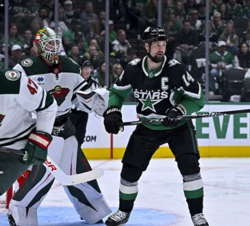 Stars left wing Jamie Benn sets up in front of the net as Wild goaltender Jesper Wallstedt tracks the play.