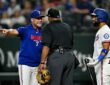 Texas Rangers shortstop Ezequiel Duran, No. 20, and manager Jared “Skip” Schumaker, No. 55, argue a called strike with home plate umpire Laz Diaz during the ninth inning against the New York Mets at Globe Life Field in Arlington, Texas, on Sept. 22, 2026.