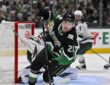 Dallas Stars left wing Jason Robertson turns up ice in front of the Minnesota net at American Airlines Center.