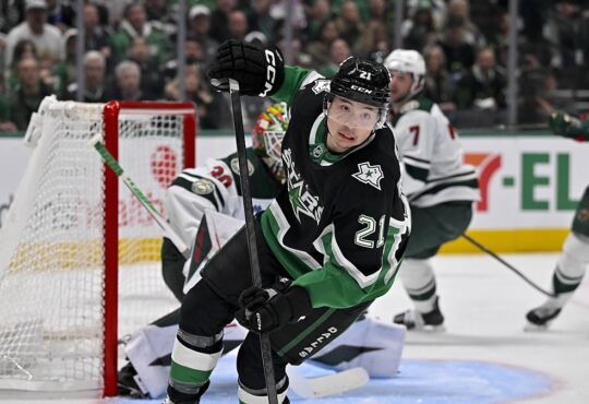 Dallas Stars left wing Jason Robertson turns up ice in front of the Minnesota net at American Airlines Center.