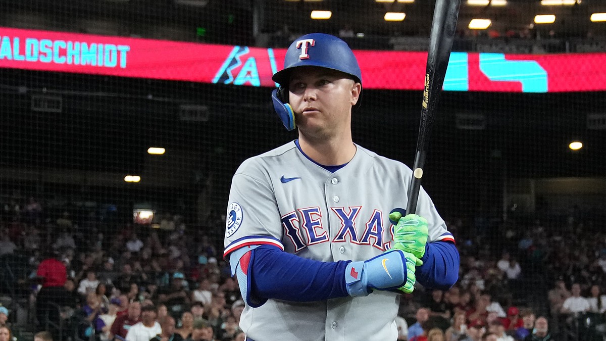 Texas Rangers designated hitter Joc Pederson holds his bat up as he waits to step in against Arizona.