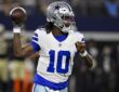 Dallas Cowboys quarterback Joe Milton III cocks his arm to throw against the New Orleans Saints.