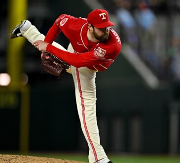 Texas Rangers pitcher Jordan Montgomery follows through off the mound with his back leg kicked high.