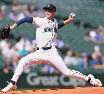 Seattle Mariners starting pitcher Kade Anderson strides toward the plate and cocks his arm to throw.