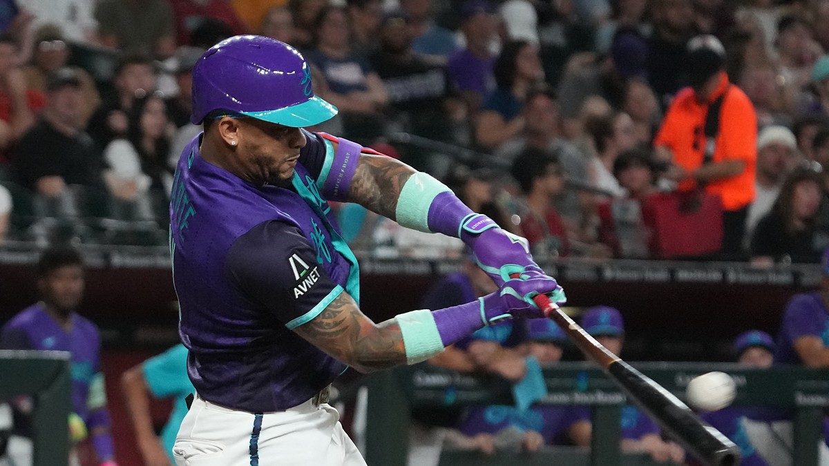 Arizona Diamondbacks second baseman Ketel Marte drives through his swing as the ball comes off the bat.