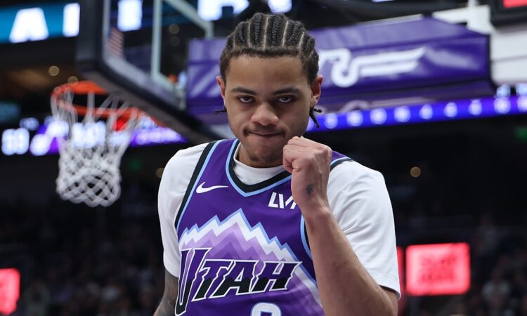 Utah Jazz guard Keyonte George raises a clenched fist as he reacts during a game against the Nets.