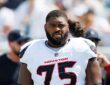 Houston Texans guard Laken Tomlinson stands on the field in uniform before a game against the Jaguars.