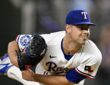 Texas Rangers starting pitcher MacKenzie Gore follows through with his glove hand extended after releasing a pitch.