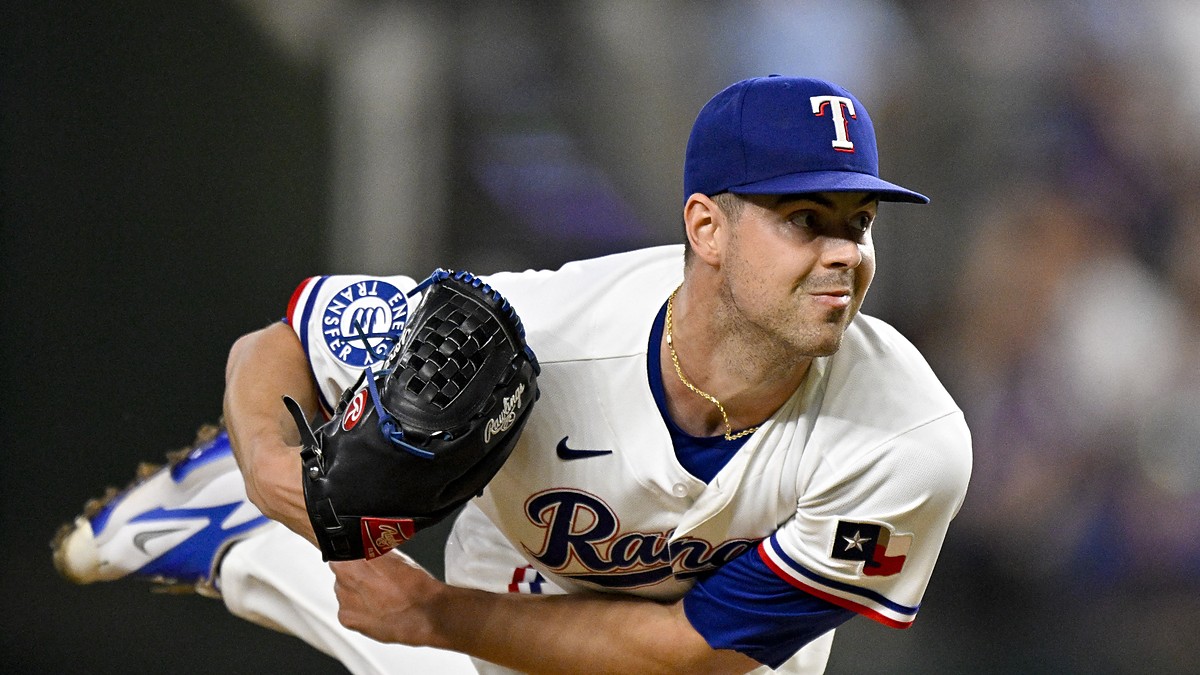 Texas Rangers starting pitcher MacKenzie Gore follows through with his glove hand extended after releasing a pitch.