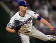 Texas Rangers starting pitcher MacKenzie Gore follows through on a pitch with his back leg kicked out behind him.