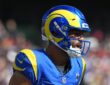 Los Angeles Rams wide receiver Makea Nacua shouts through his face mask after making a catch.