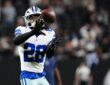 Dallas Cowboys safety Malik Hooker catches a ball during pregame warmups at Allegiant Stadium.