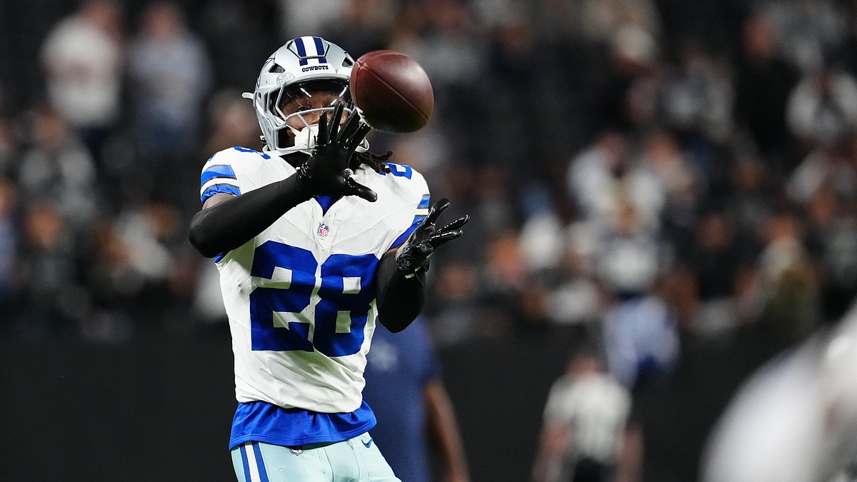 Dallas Cowboys safety Malik Hooker catches a ball during pregame warmups at Allegiant Stadium.