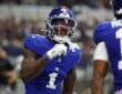 New York Giants wide receiver Malik Nabers celebrates after scoring a touchdown against the Dallas Cowboys.