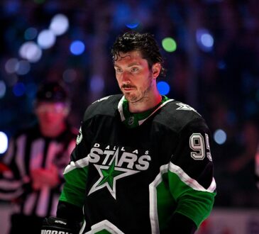 Stars center Matt Duchene stands on the ice under arena lights before puck drop against the Wild.