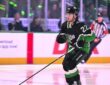Dallas Stars center Mavrik Bourque, No. 22, skates with his stick out before a playoff game.