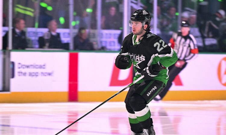 Dallas Stars center Mavrik Bourque, No. 22, skates with his stick out before a playoff game.