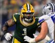 Green Bay Packers defensive end Micah Parsons comes off the line against a Dallas Cowboys blocker.
