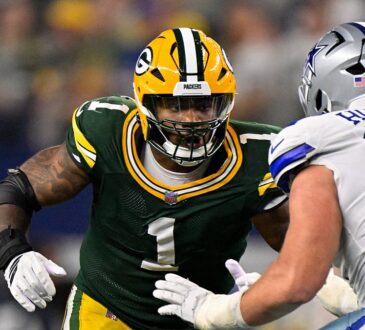 Green Bay Packers defensive end Micah Parsons comes off the line against a Dallas Cowboys blocker.