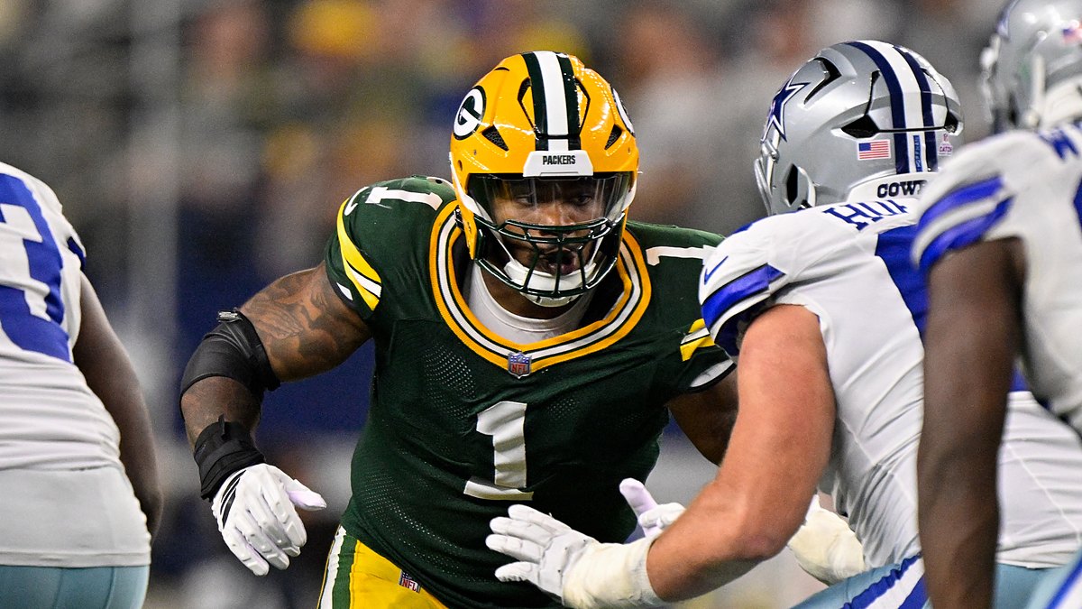 Green Bay Packers defensive end Micah Parsons comes off the line against a Dallas Cowboys blocker.