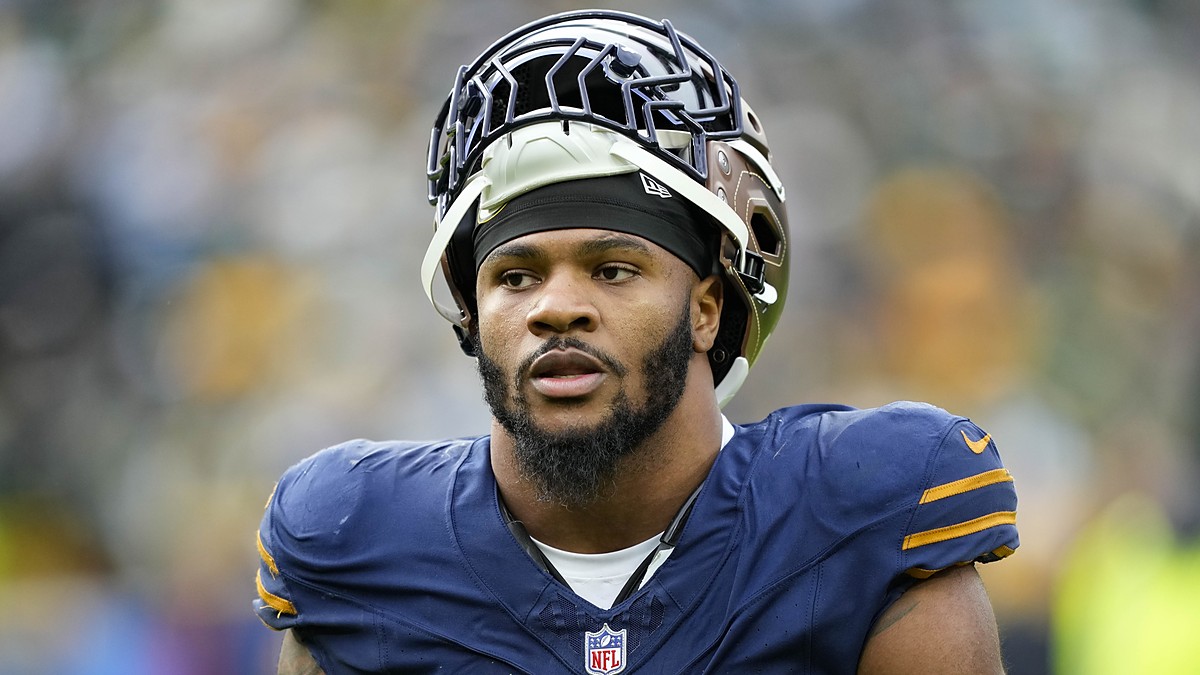 Green Bay Packers defensive end Micah Parsons walks off with his helmet pushed up after a game against Carolina.