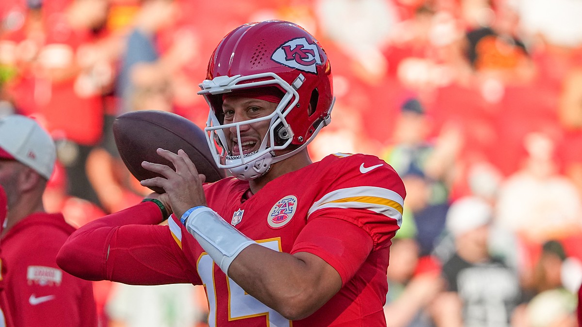 Kansas City Chiefs quarterback Patrick Mahomes cocks the ball to throw during warmups before a game against the Seahawks.