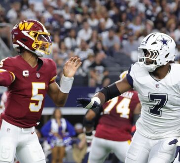Washington Commanders quarterback Jayden Daniels throws a pass as Cowboys linebacker Rashan Gary rushes toward him.