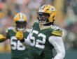 Green Bay Packers defensive end Rashan Gary pumps a fist in celebration after sacking Bears quarterback Caleb Williams.