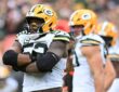 Green Bay Packers defensive end Rashan Gary crosses his arms in celebration after a sack against the Browns.