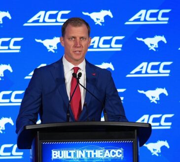 SMU head coach Rhett Lashlee speaks at a podium in front of an ACC and Mustangs backdrop.