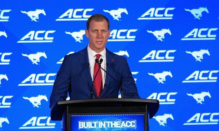 SMU head coach Rhett Lashlee speaks at a podium in front of an ACC and Mustangs backdrop.