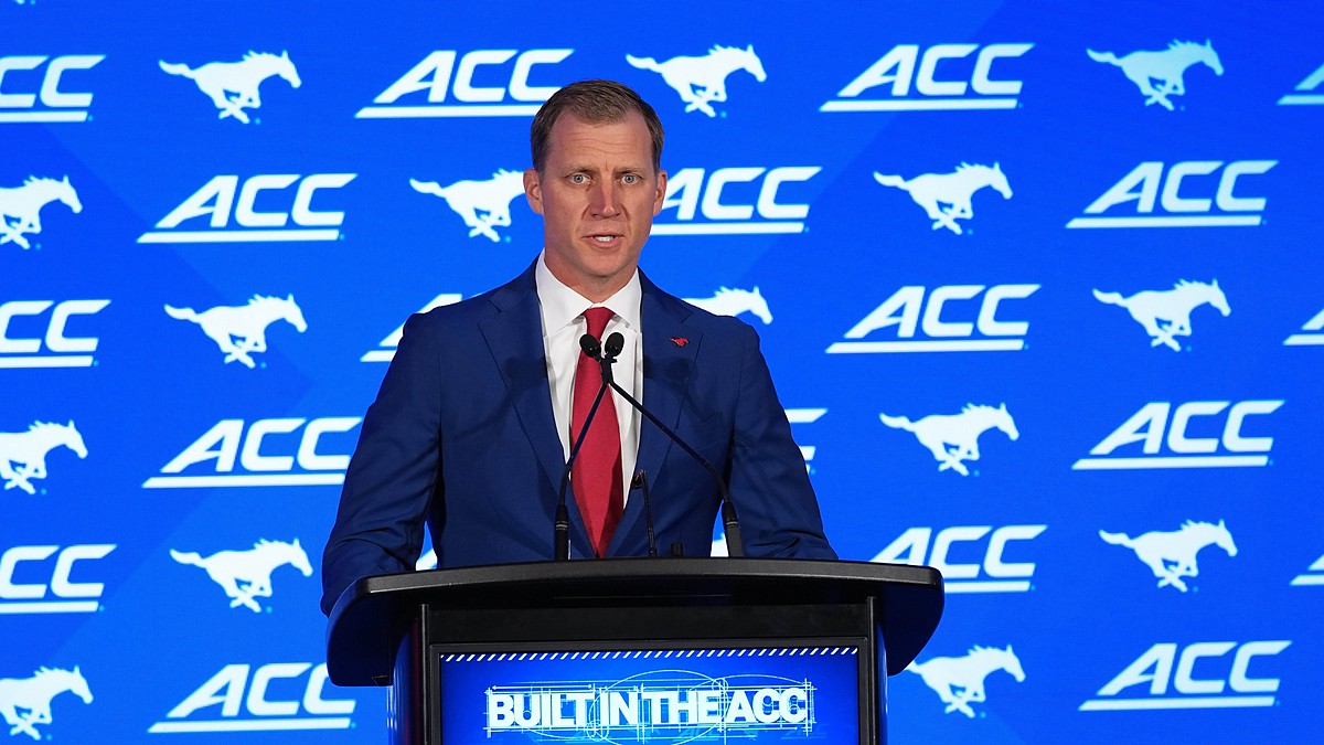 SMU head coach Rhett Lashlee speaks at a podium in front of an ACC and Mustangs backdrop.