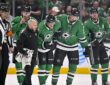 Dallas Stars center Roope Hintz is helped off the ice by teammates after an injury at American Airlines Center.