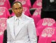 ESPN analyst Stephen A. Smith stands courtside in a light suit before an NBA Finals game.
